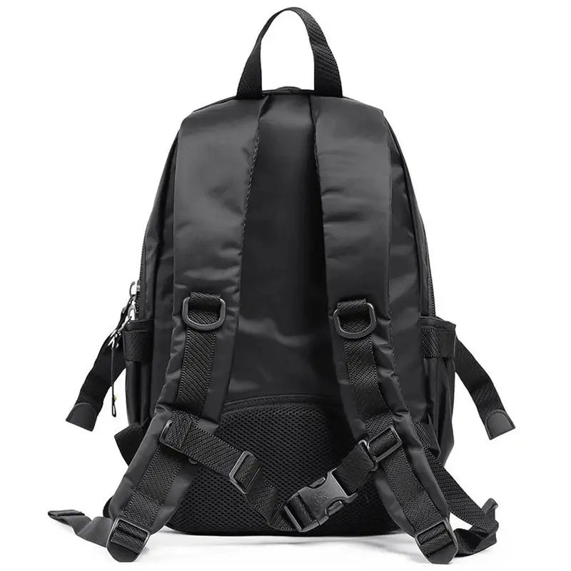 Sac à dos multi rangement en nylon noir avec compartiment pour ordinateur et poignée supérieure