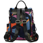 Sac à dos multicolore pour femme avec motif géométrique coloré, bretelles noires et hardware argenté