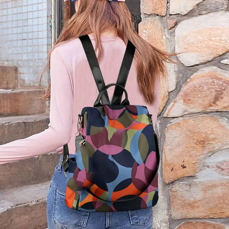 Sac à dos multicolore pour femme avec motif coloré et antivol sécurisé