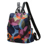 Sac à dos multicolore pour femme avec motif géométrique et bretelles ajustables