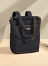 Sac à dos multifonction femme noir convertible avec bretelles marron et accents dorés