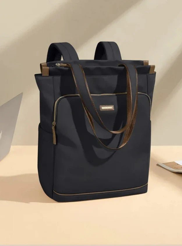 Sac à dos multifonction femme noir convertible avec bretelles marron et accents dorés