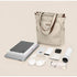 Sac à dos multifonction femme beige avec bretelles marron et nombreuses poches
