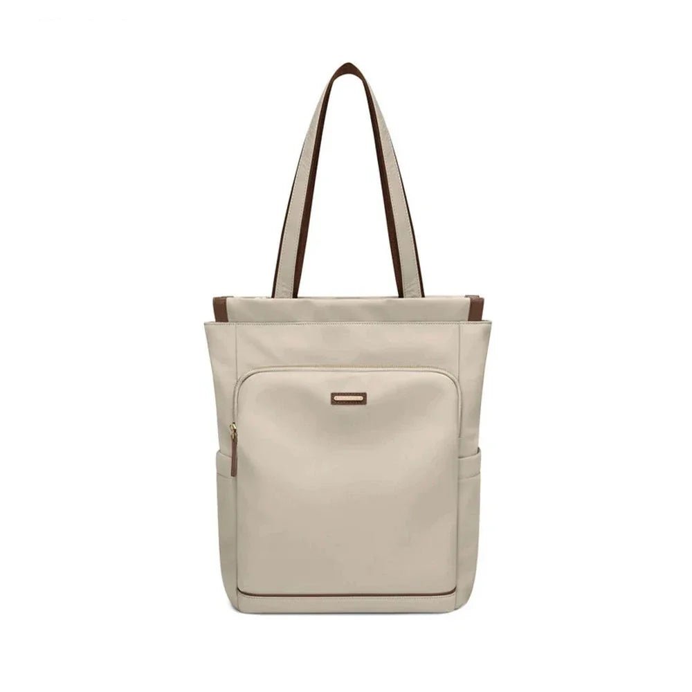 Sac à dos multifonction femme en toile beige avec poignées en cuir marron