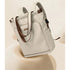 Sac à dos multifonction femme léger avec convertible en sac à main et bretelles brunes