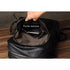 Sac à dos noir en cuir véritable avec poche intérieure zippée pour un style élégant
