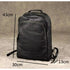 Sac à dos noir en cuir véritable avec plusieurs compartiments zippés et bretelles ajustables