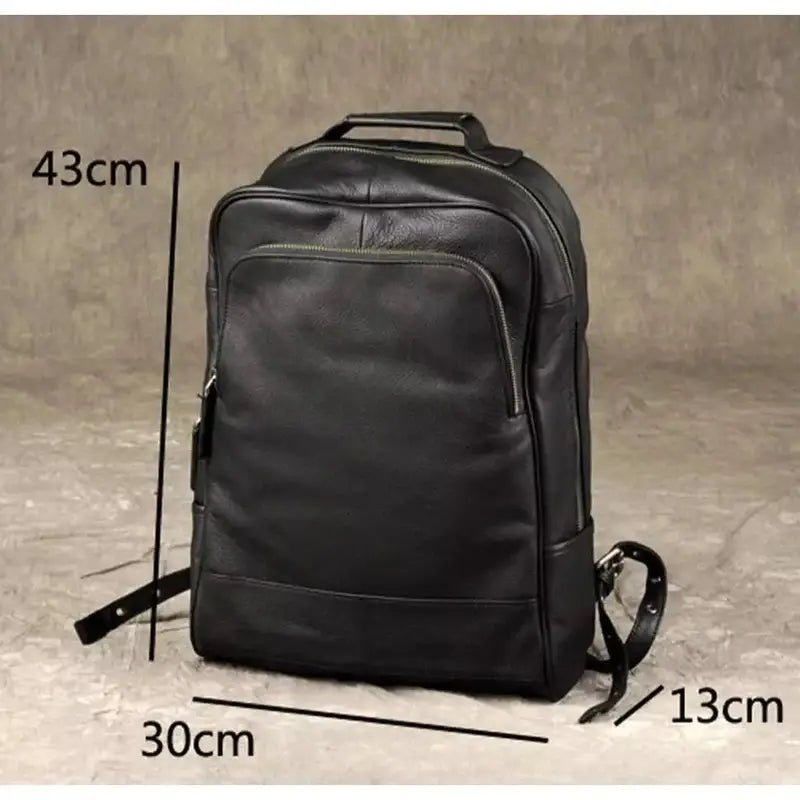 Sac à dos noir en cuir véritable avec plusieurs compartiments zippés et bretelles ajustables