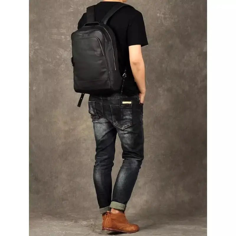 Sac à dos noir en cuir véritable avec compartiment principal zippé