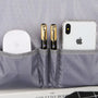 Organisateur de rangement gris à motif miel avec appareils Apple et stylos dans un sac à dos ordinateur 15 pouces 25L