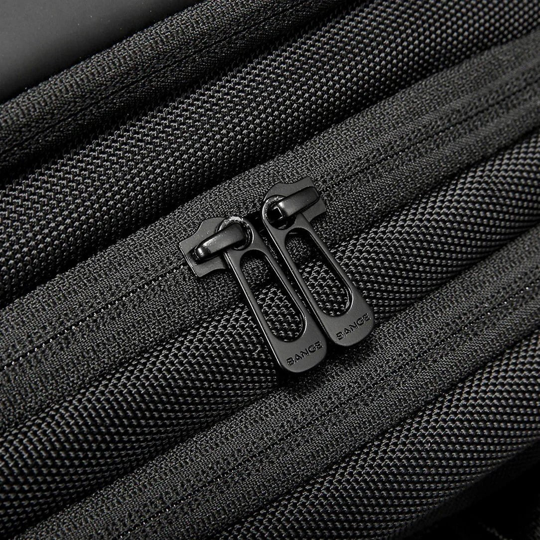 Poignées de fermeture éclair en textile noir sur tissu texturé pour Sac à dos ordinateur 17 pouces Orion