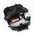 Sac à dos ordinateur homme imitation cuir noir rempli d’articles variés