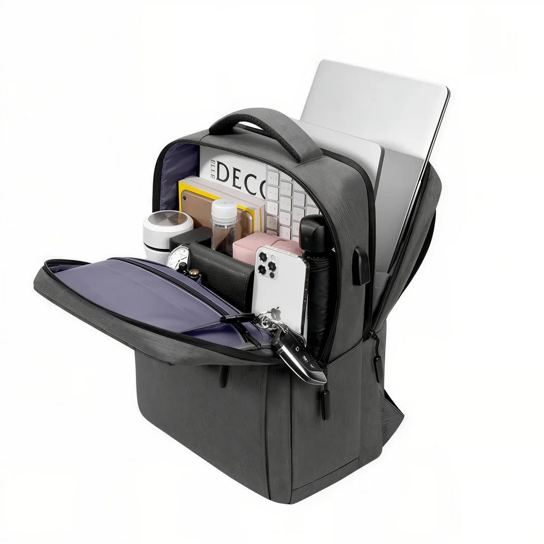 Sac à dos PC portable 17 pouces Urban Nova gris ouvert avec objets personnels et ordinateur portable