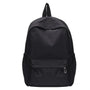 Sac à dos petite fille minimaliste en nylon noir avec poche zippée frontale