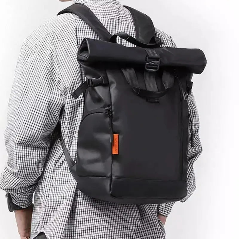 Sac à dos pour pc homme TangoColl 16 noir avec une étiquette orange