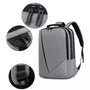 Sac à dos pour pc portable minimaliste gris avec accents noirs et compartiments zippés