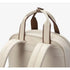 Sac à dos pratique pour femme en crème avec accents marron et poignée supérieure