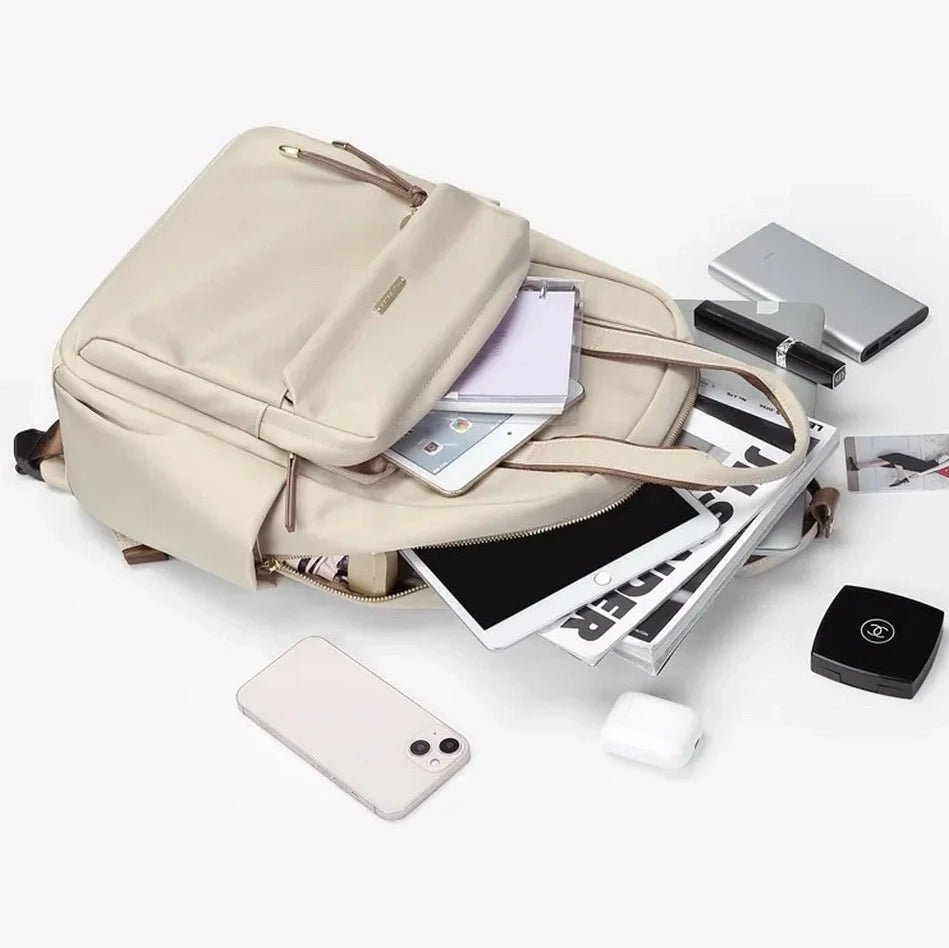Sac à dos pratique pour femme léger avec plusieurs compartiments et appareils électroniques