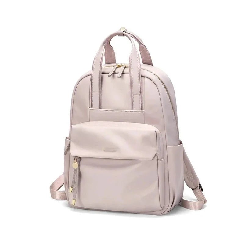 Sac à dos pratique pour femme en violet clair avec plusieurs compartiments et zippers dorés
