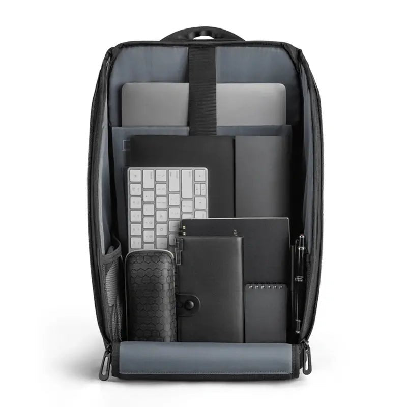Sac à dos professionnel femme noir ouvert avec compartiments pour électronique et documents