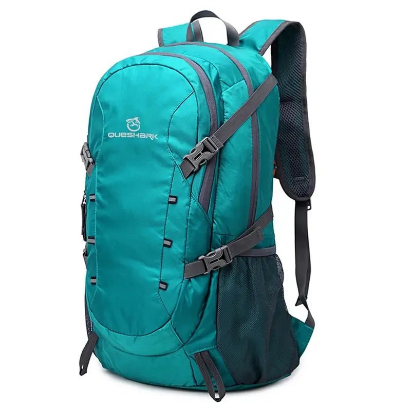 Sac à dos randonnée étanche teal avec plusieurs compartiments et bretelles ajustables