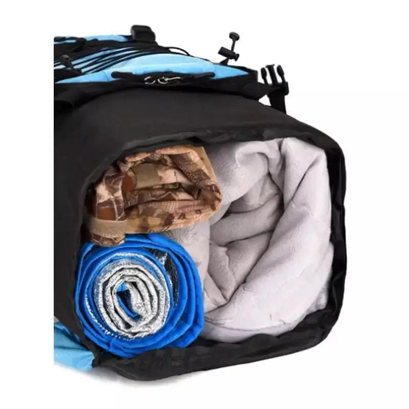 Sac à dos randonnée homme 90l noir et bleu rempli d’équipement de camping
