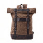 Sac à dos rétro en tissu waxé brun avec bretelles en cuir foncé et boucles