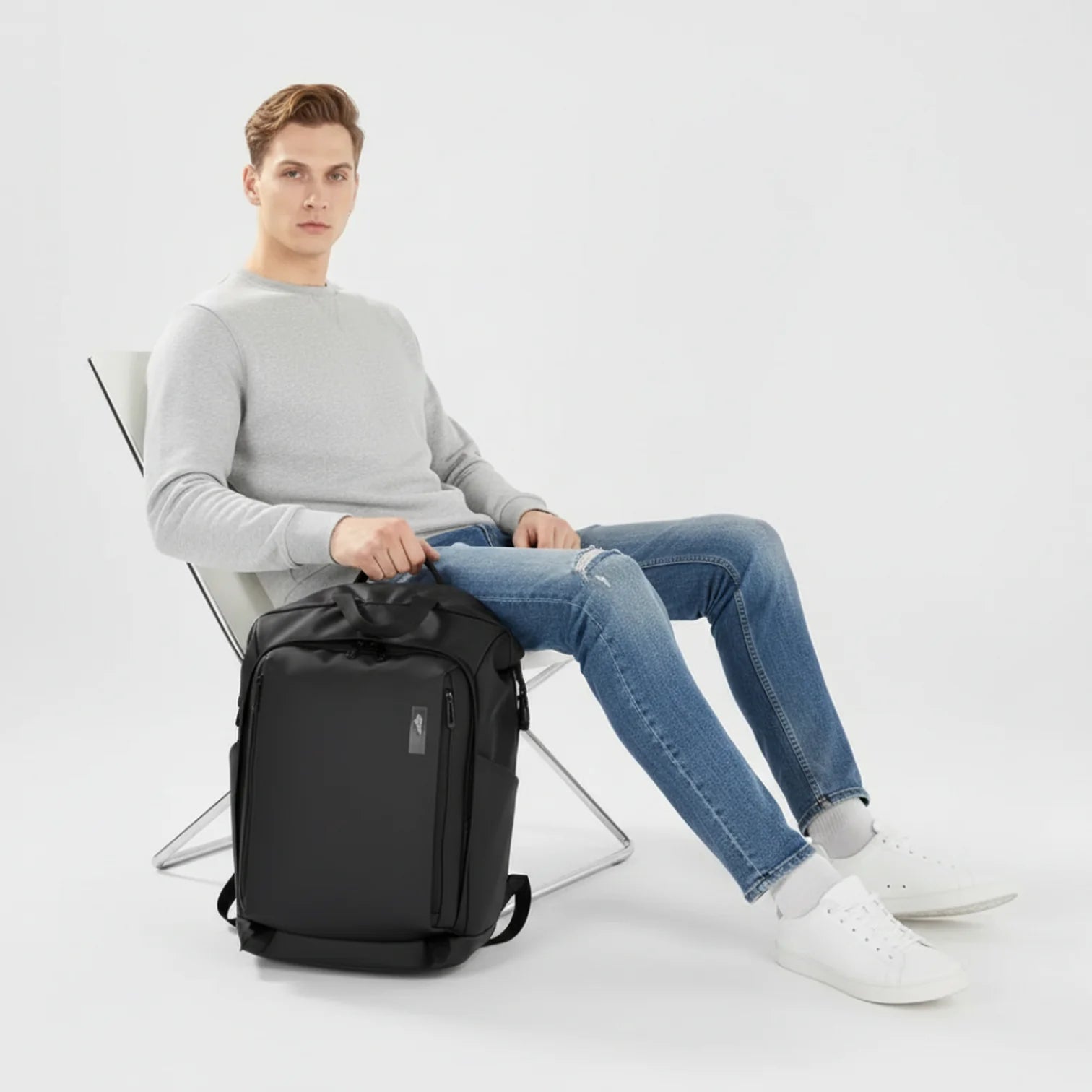 Sac à dos Polaris noir roll top urbain, design minimaliste et logo discret latéral