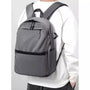 Sac à dos scolaire collège gris décontracté avec plusieurs compartiments zippés et poches latérales