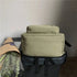 Sac à dos scolaire vert clair avec glacière souple rectangulaire, poignée et bandoulière