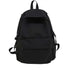 Sac à dos scolaire en tissu noir avec poches zippées et bretelles ajustables