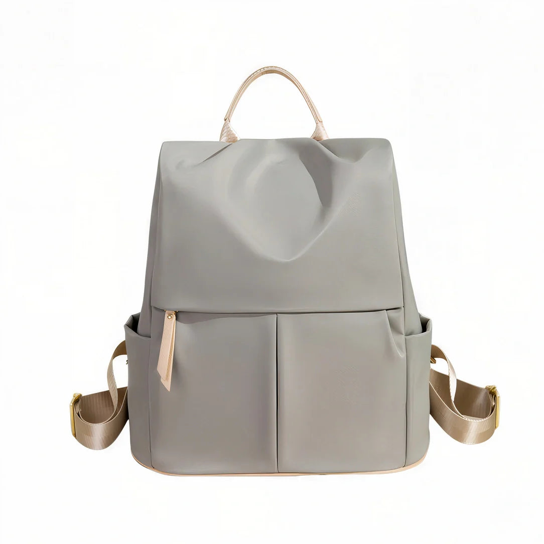 Sac à dos Sienna gris avec accents et poignées dorés, nylon