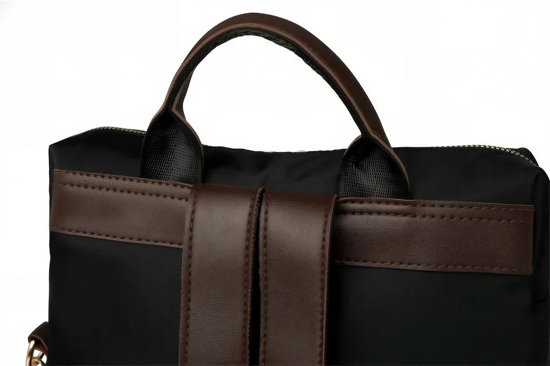 Sac à dos Sirocco en toile canvas noir et marron avec accents cuir