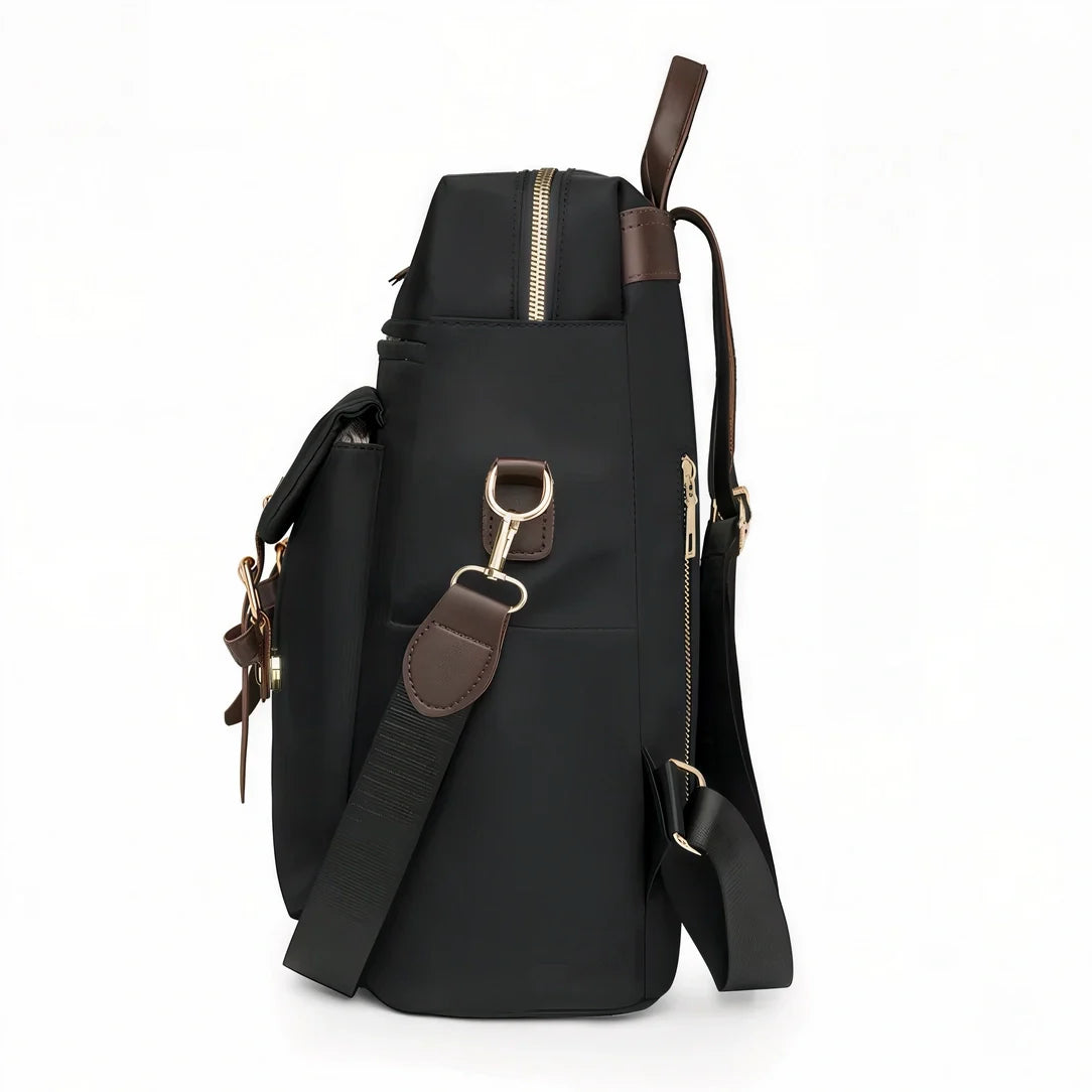 Sac à dos Sirocco en toile noire avec accents cuir marron