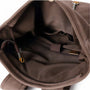 Intérieur du sac à dos style vintage Era en brun avec plusieurs poches et fermeture éclair