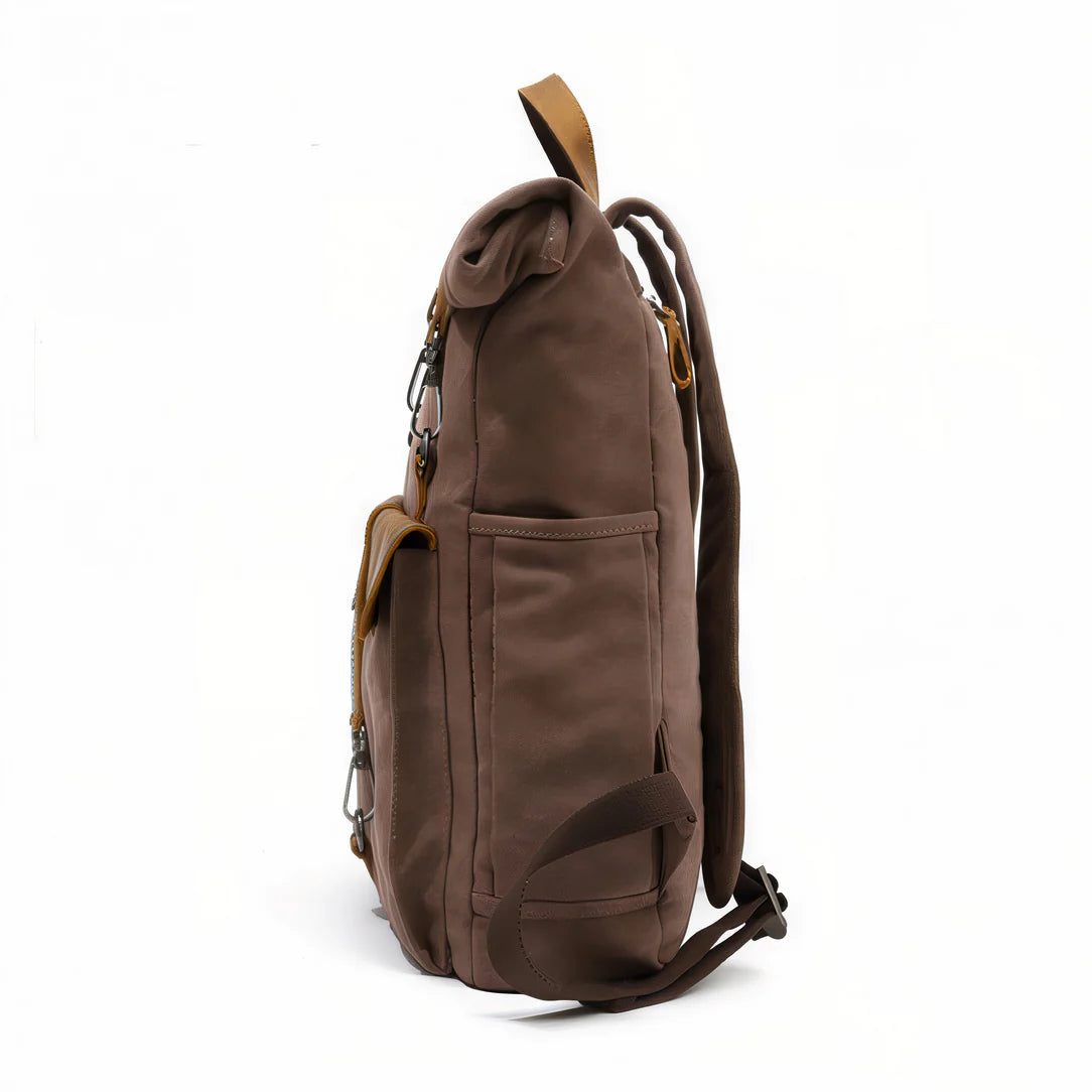 Sac à dos vintage en toile marron avec accents en cuir et multiples poches