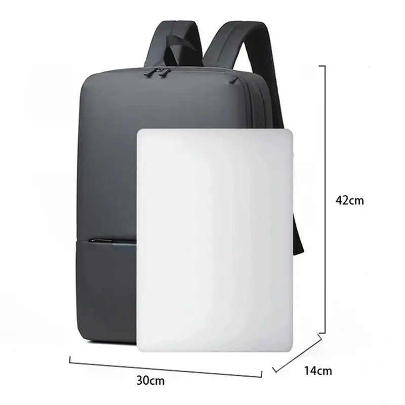 Sac à dos tablette gris foncé minimaliste avec bretelles, fermeture zip et compartiment inférieur