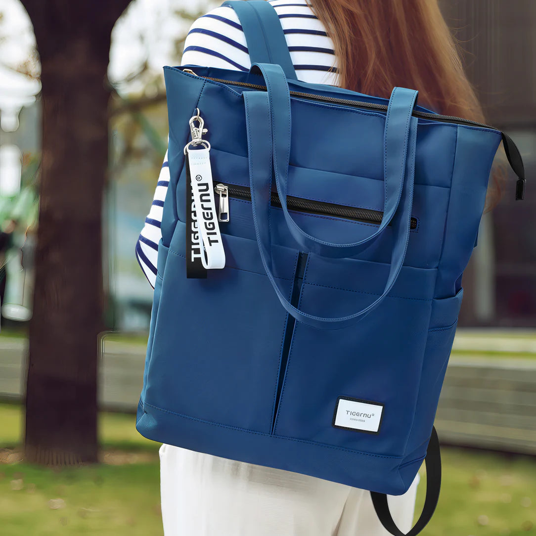 Sac à dos Tigernu Campus en nylon bleu avec fermeture éclair blanche et étiquette de marque