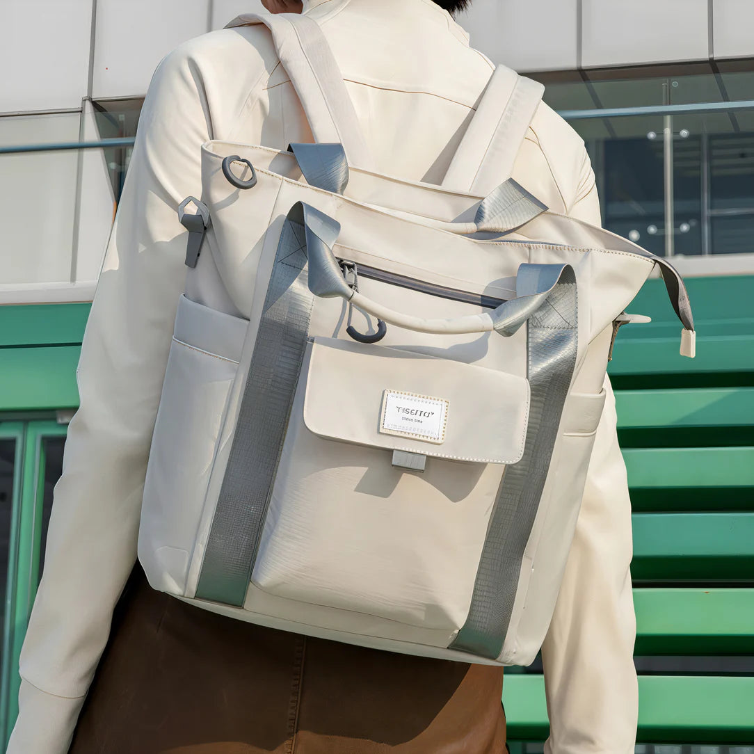 Sac à dos Tigernu Eclipse beige avec accents noirs et bretelles ajustables