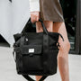 Sac à dos Tigernu Eclipse en nylon noir avec bandoulière ajustable et poche frontale