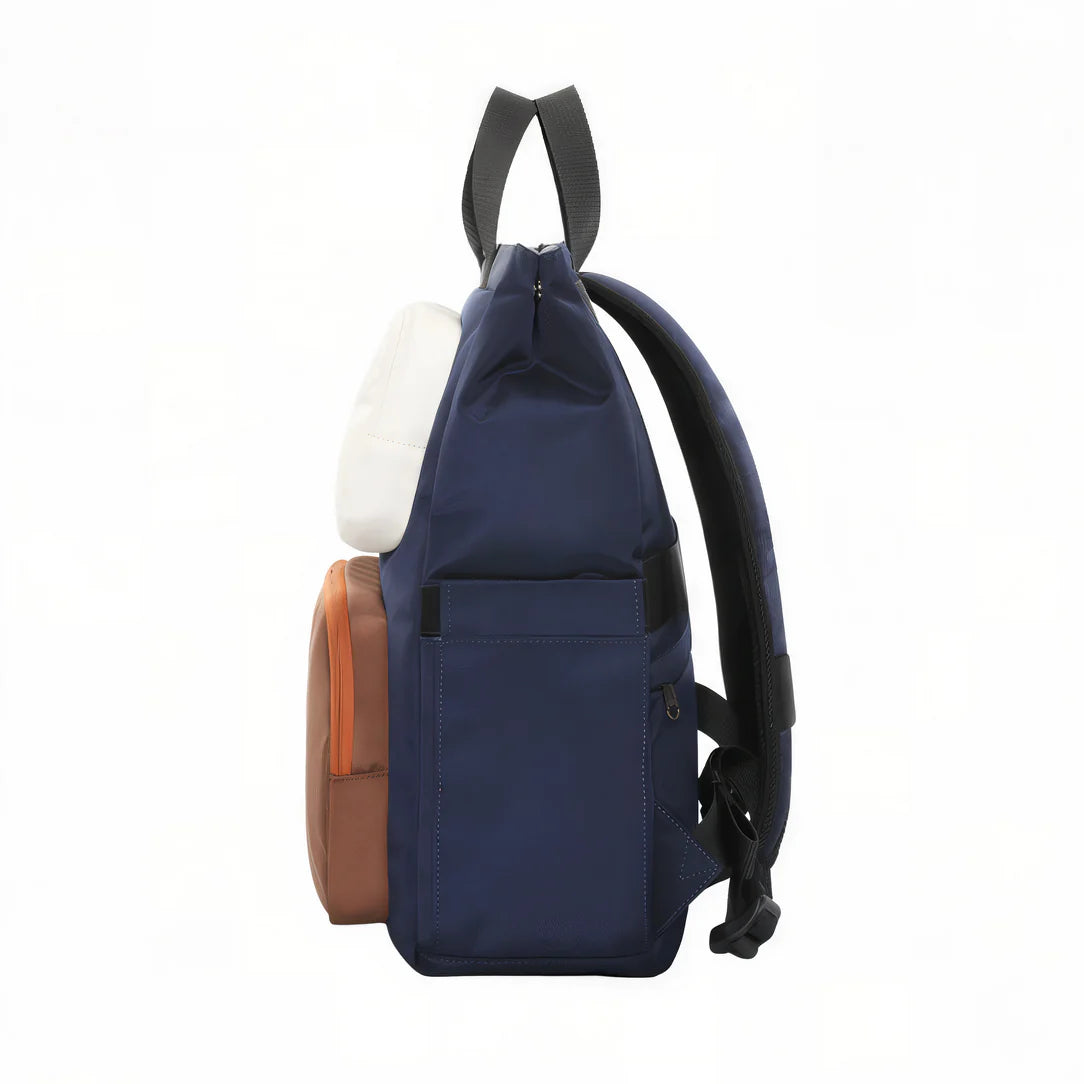 Sac à dos Tigernu Origin bleu marine avec accents orange et bretelles noires pour usage casual