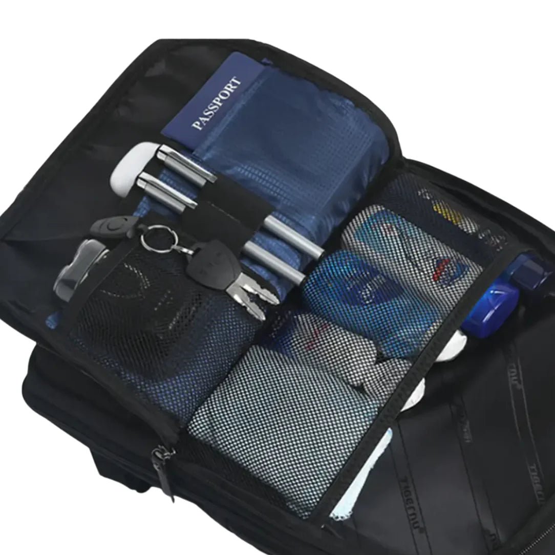 Sac à dos ultra plat extensible NeoFlat X ouvert avec compartiments et objets personnels