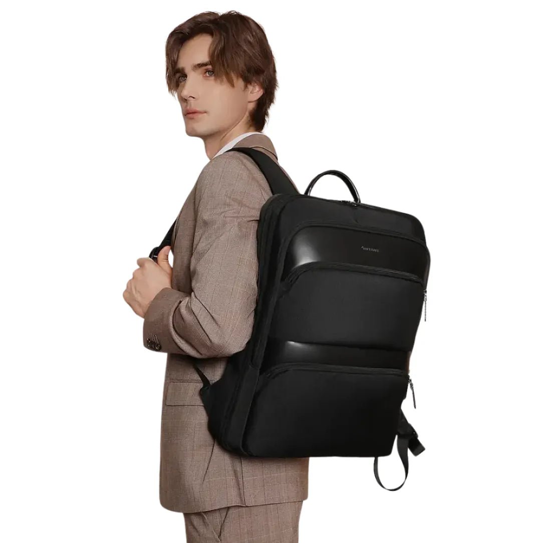 Sac à dos ultra plat extensible NeoFlat X noir avec plusieurs compartiments et poignée supérieure