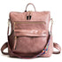 Sac à dos vintage femme en similicuir mauve avec zips dorés et bandoulière colorée