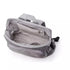 Sac à langer à dos gris ouvert avec multiples poches internes et externes