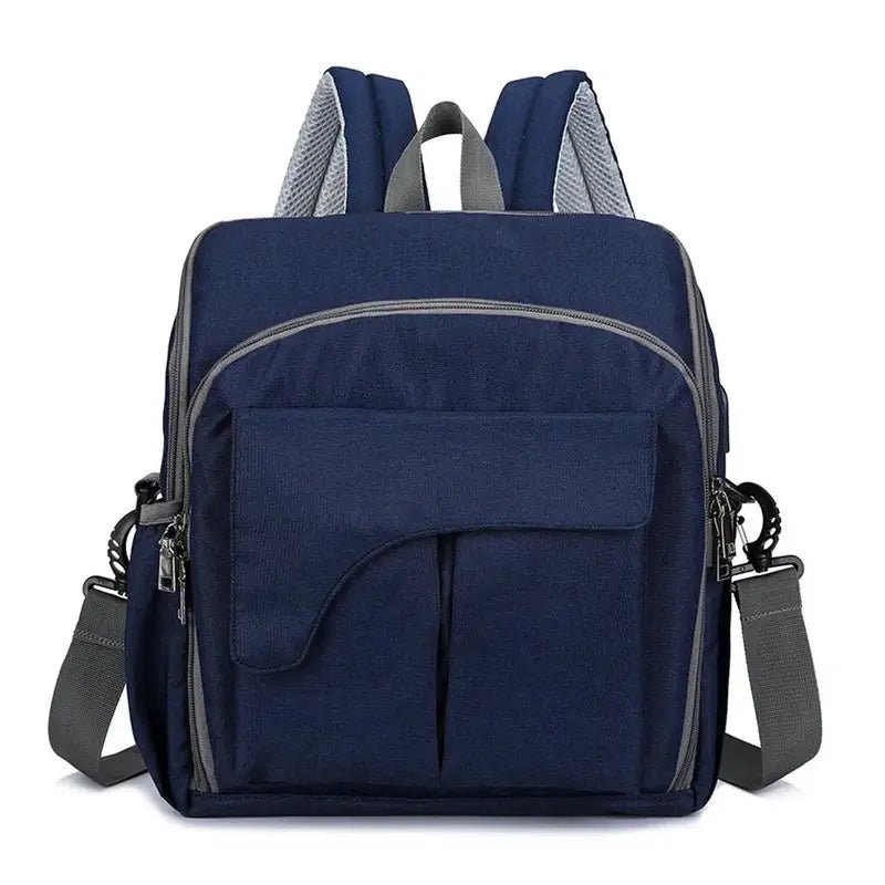Sac à langer pour bébé en bleu marine avec sac à dos multifonction et bretelles