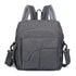 Sac à langer pour bébé en toile gris foncé avec plusieurs poches et bandoulières amovibles