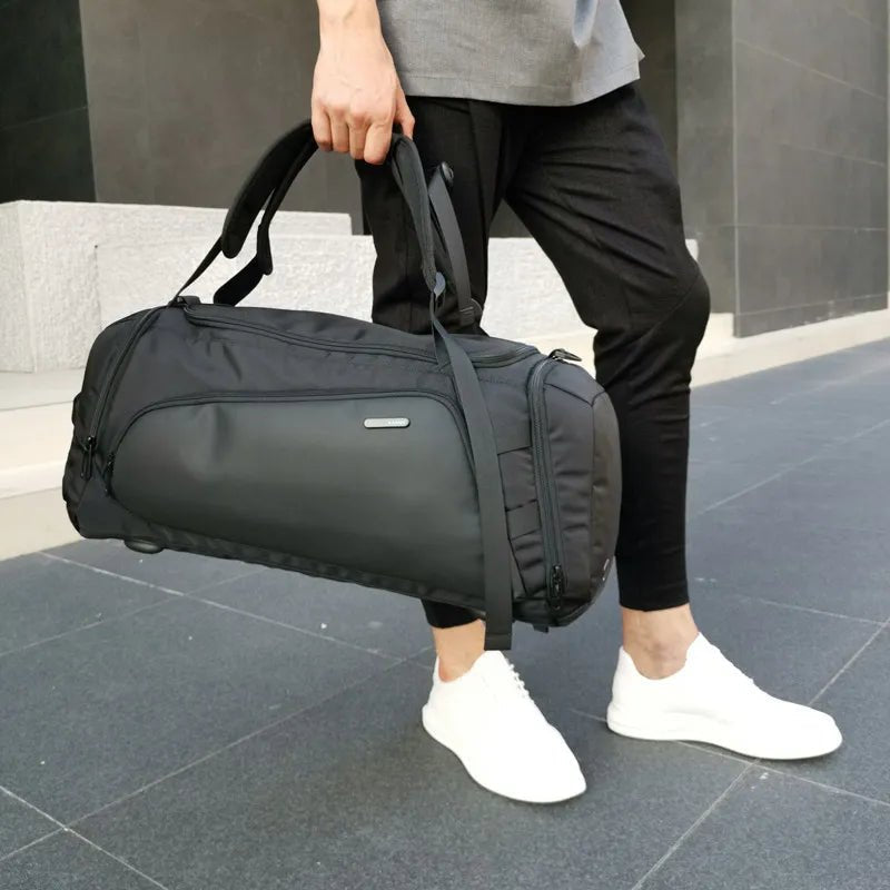 Sac de sport sac à dos noir avec bandoulière et compartiments latéraux