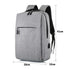 Sac minimaliste ordi portable femme en tissu gris clair avec zippers noirs et poches
